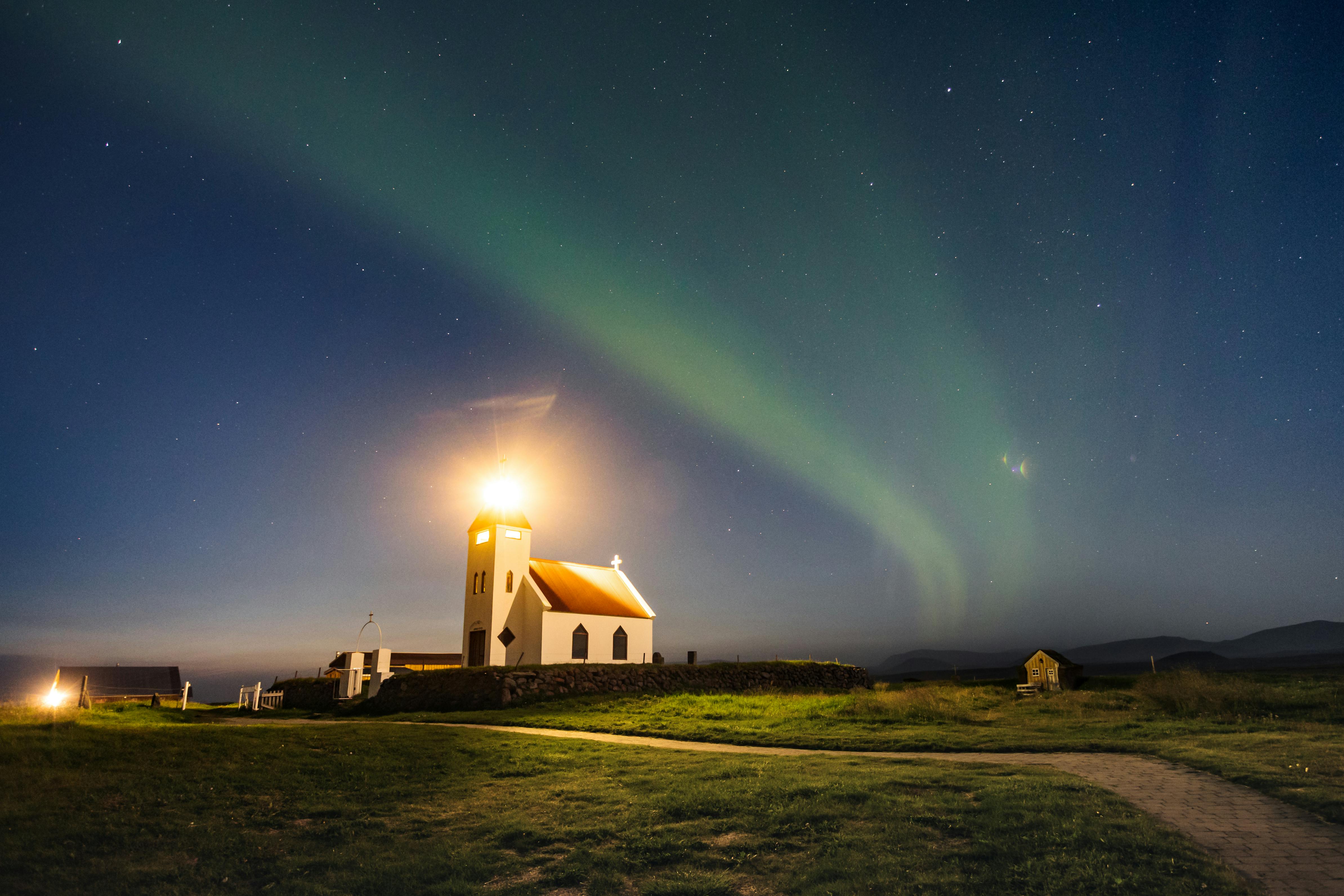 Lighthouse with aurora borealis